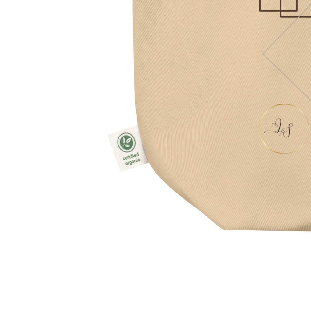 Close-up detail of the beige Lumine tote bag with certified organic cotton label