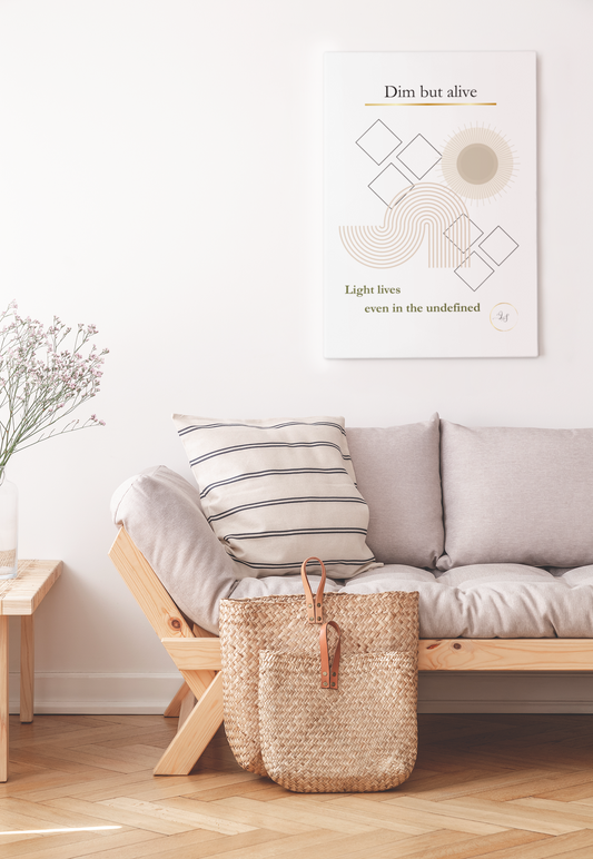 Minimalist neutral wall art displayed above a light sofa in a modern living room