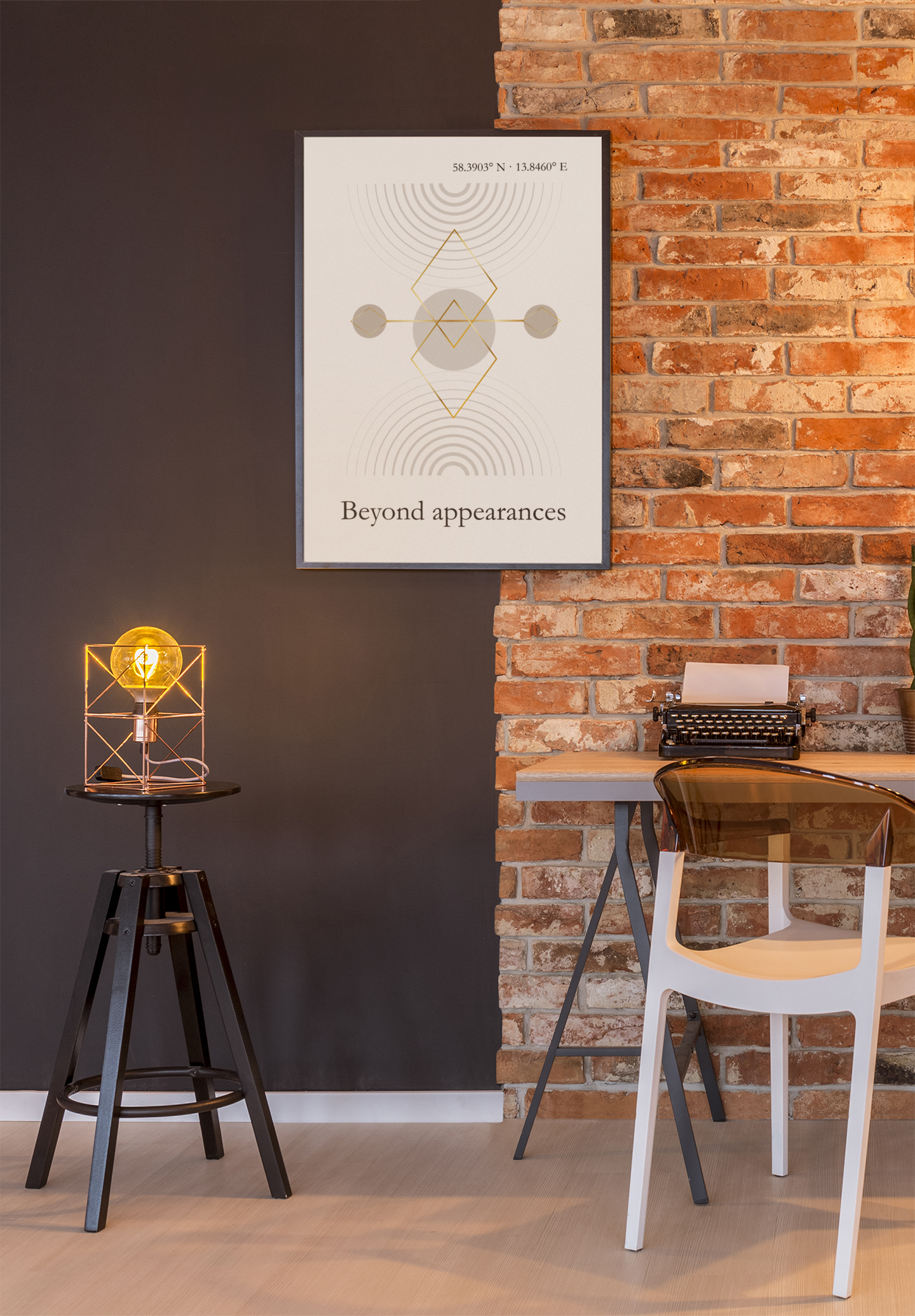 Minimalist geometric wall art print on a brick wall in a modern workspaces with desk and chair