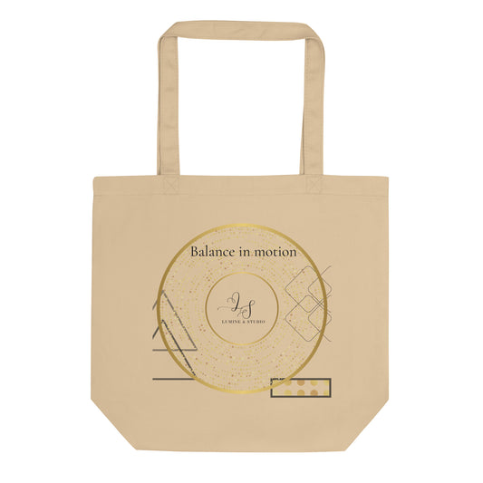 Oyster eco tote bag with a minimalist gold geometric Balance in Motion design, front view