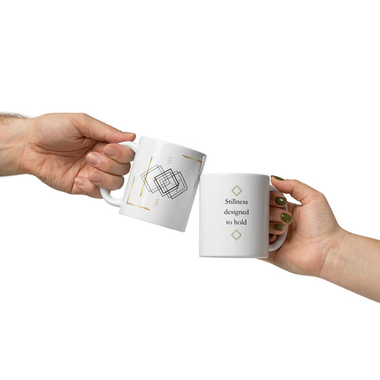 Twowhite 11 oz ceramic mugs held by hand, featuring minimalist geometric line art and typography.