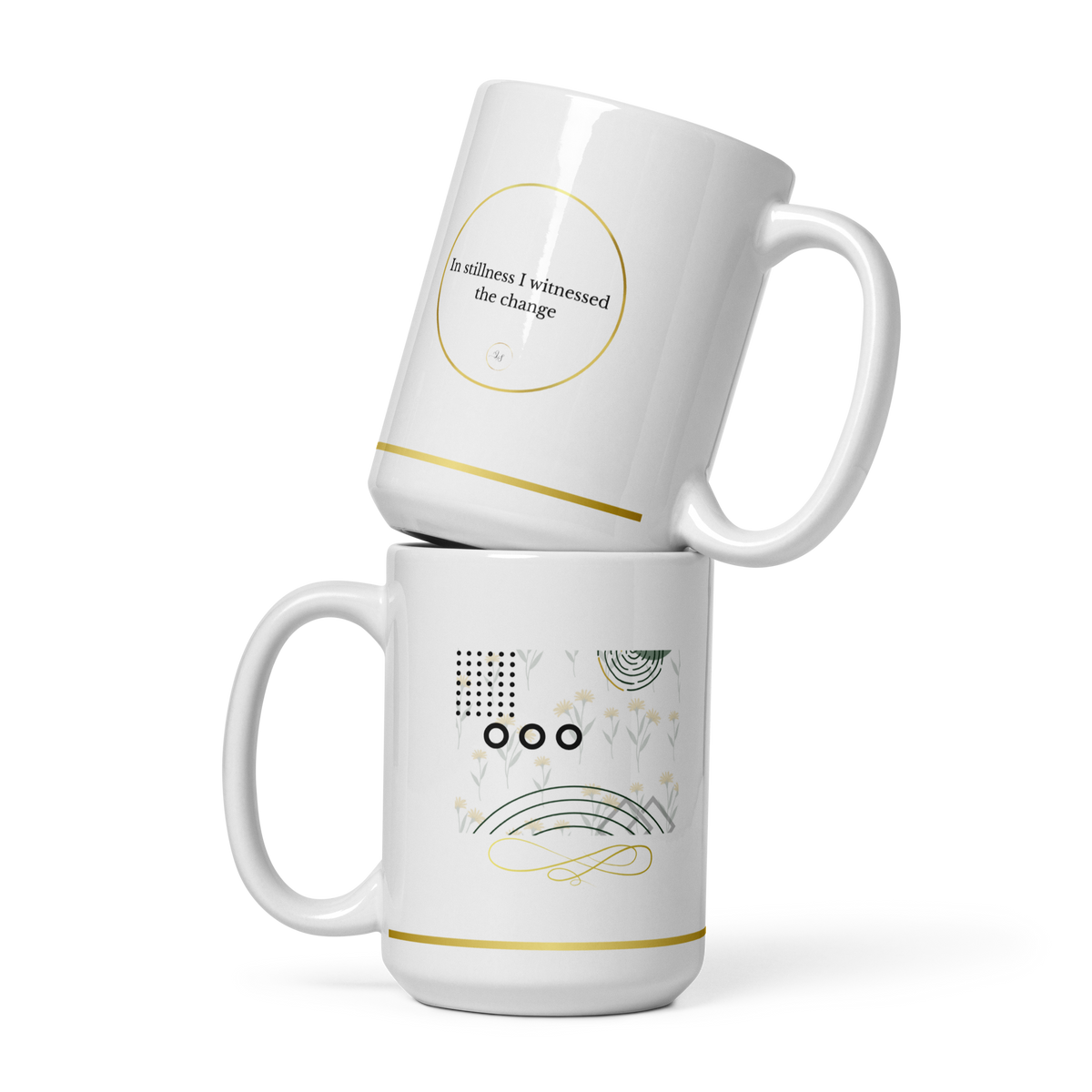 White 15 oz ceramic mug shown from both sides with minimalist abstract graphics, typography, and subtle gold details.