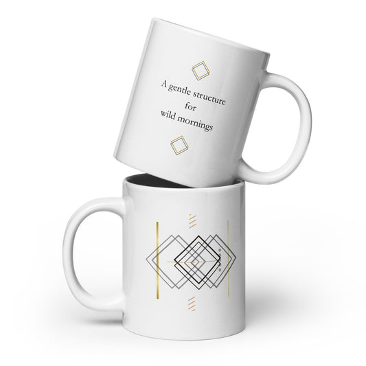 White ceramic mug shown from both sides with minimalist typography and geometric line art.