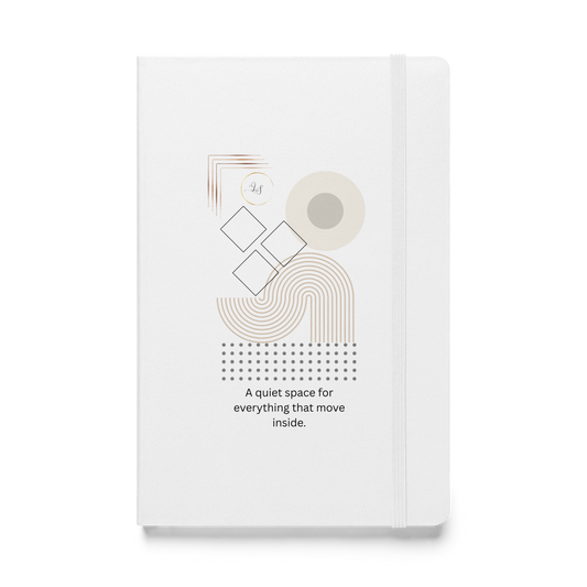 White hardcover notebook with minimalist geometric design by Lumine Studio, front view